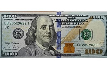 Доллар рухнул ниже 77 рублей: предновогоднее затишье добивает валюту